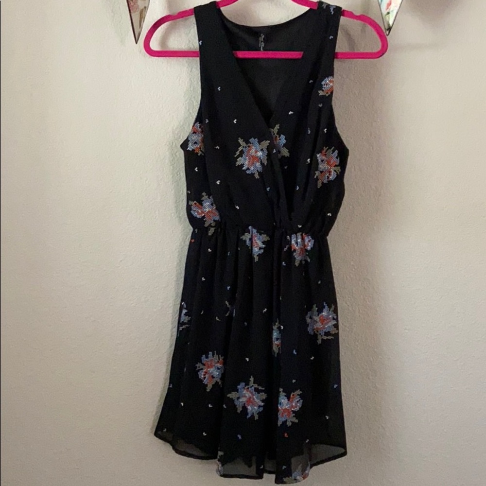Summer dress with colorful cross-stitch detail